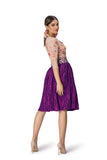 Knee-length pleated purple skirt