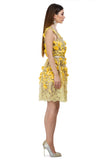 Yellow dress with 3D floral elements