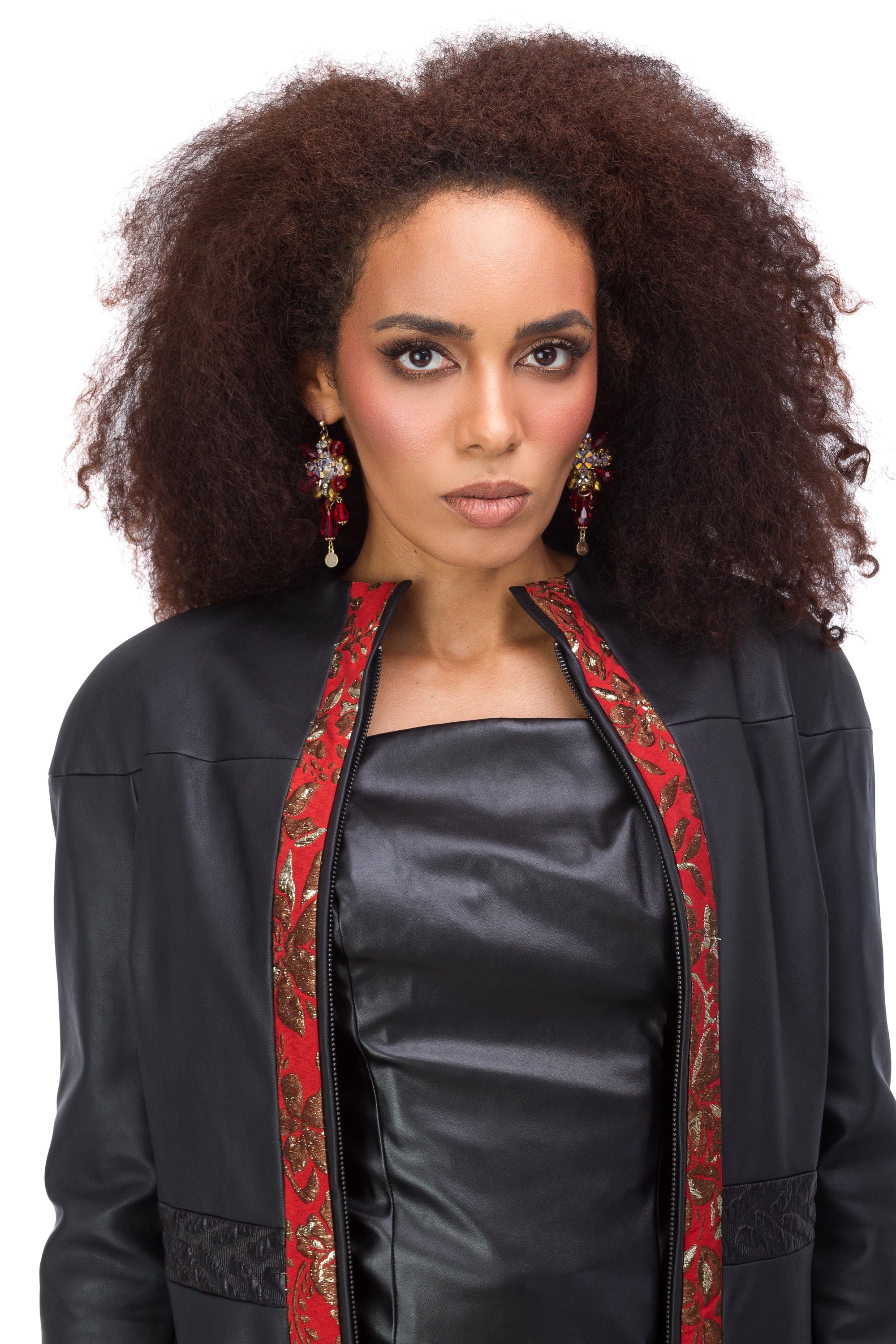Black eco-leather coat with red jacquard elements