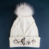 White winter hat with fur and crystals